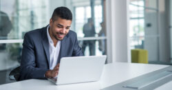 Nonprofit leader working on a laptop.