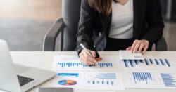 Close up of a nonprofit finance leader analyzing data, illustrating the concept of nonprofit finance roles and responsibilities.